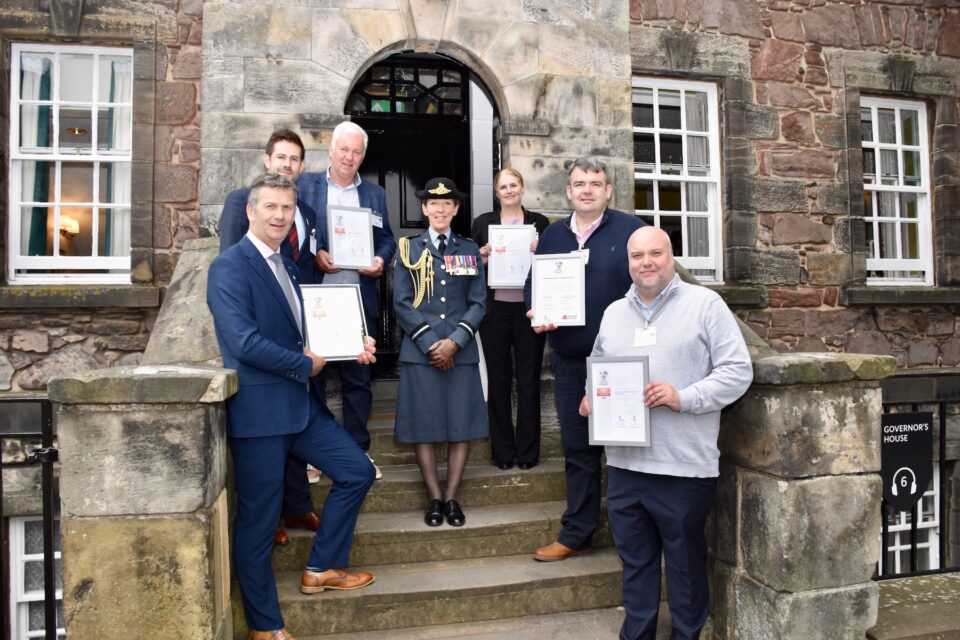 Armed Forces Covenant, ERS Bronze Award and ERS Gold Award revalidation recipients with Air Commodore Phythian outside the Officers' Mess at Edinburgh Castle.