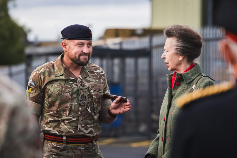 The Princess Royal speaking to a member of the Royal Logistics Corps.